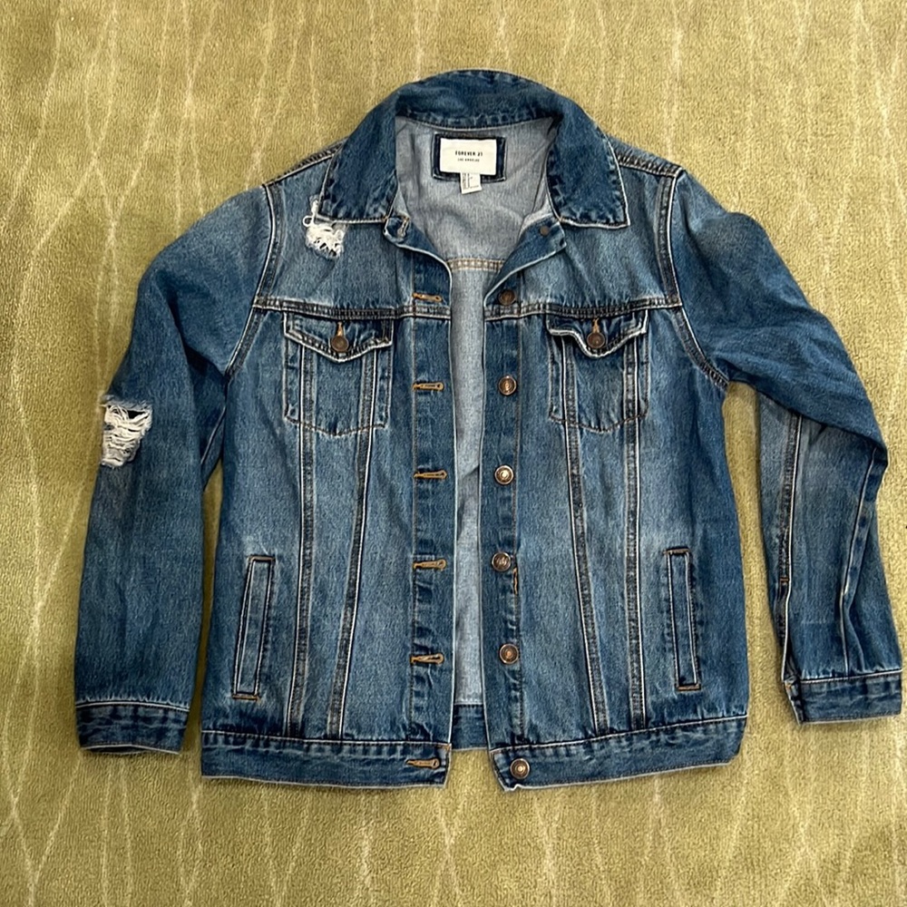 Distressed medium wash jean jacket